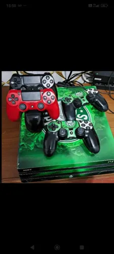 PS4 pró 1 tera com alguns jogos mídia fisica