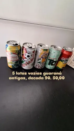 5 latas vazias refrigerantes antigas