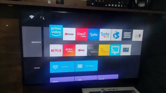 Tv 55 polegadas com faixa na tela