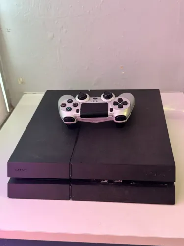 Vendo Ps4 em perfeito estado por 1.450 reais. Controle 250 reais, mais 9 jogos por 30