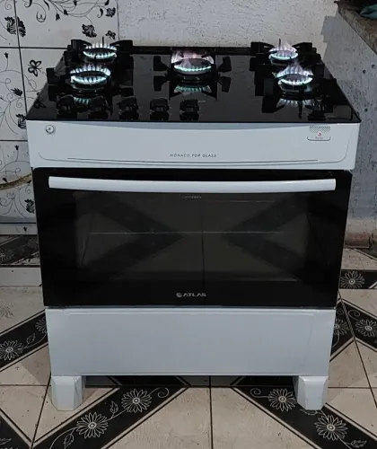 Ótimo fogão Itatiaia top de 5 com mesa de vidro com super chama automático bem conservado