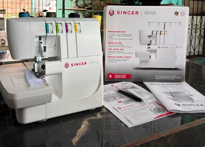 Máquina de costura singer
