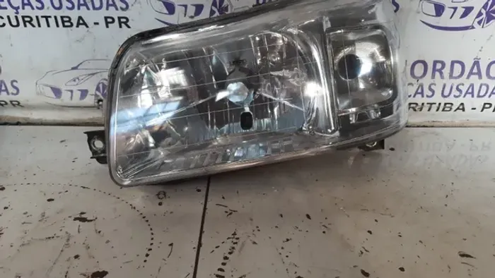 Farol direito Fiorino.