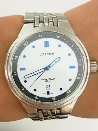 Relógio Orient quartz.