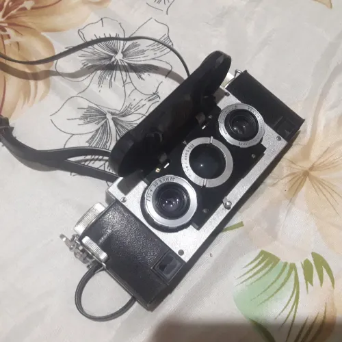 Máquina fotográfica 3* dimensão