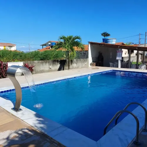 Flat mobiliado em condomínio c piscina a 50m da praia