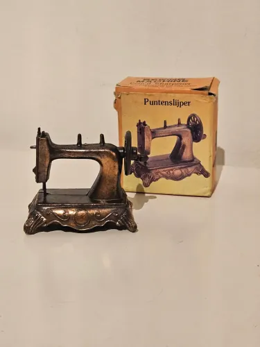 Apontador metal maquina costura