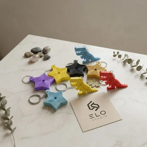 Chaveiro Fidget de estrela e Dino 3D