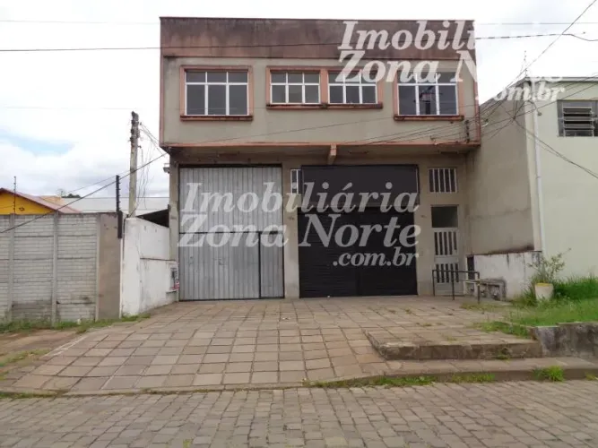 Depósito com aprox. 300m², sala, 2 banheiros, mezanino com escritório, cozinha e área de s