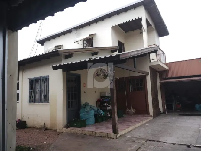 Casa com 3 dormitórios à venda, 300 m² por R$ 595.000 - Vila Rica - Portão/RS