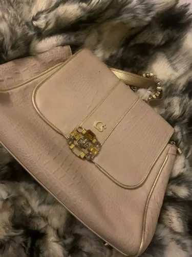 Bolsa da marca Carmen Steffens em couro legítimo na cor bege  com pedraria  CS