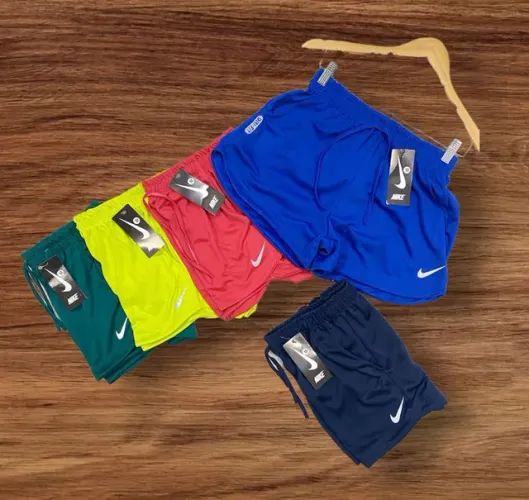 Shorts feminino material DRI FIT pontuação p.m.g.gg