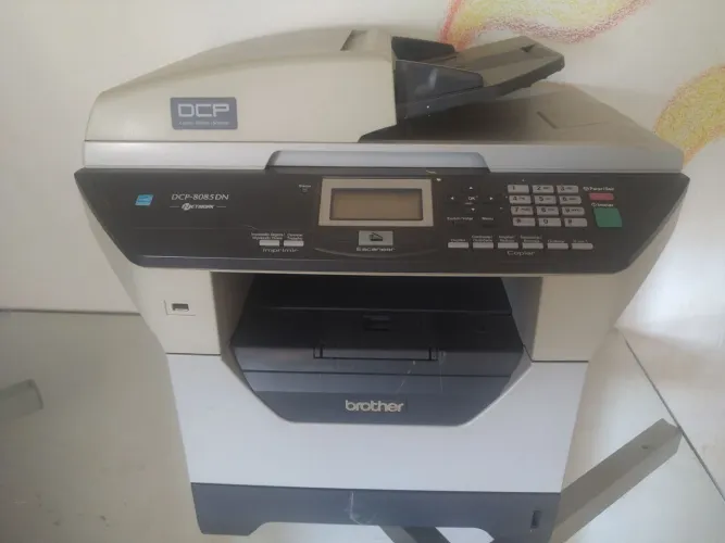 Vende-se uma impressora profissional seminova com vatias funcoes 
