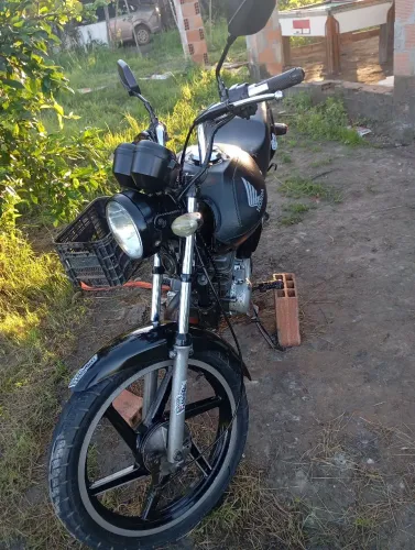 Vendo cg fan 125  2011 conservada valor  9.0000