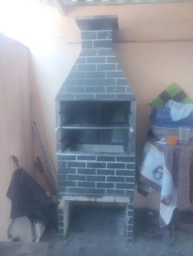 Churrasqueira de tijolo acabamento inox