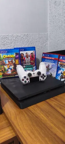 ps4 slim + 4 jogos aceito propostas