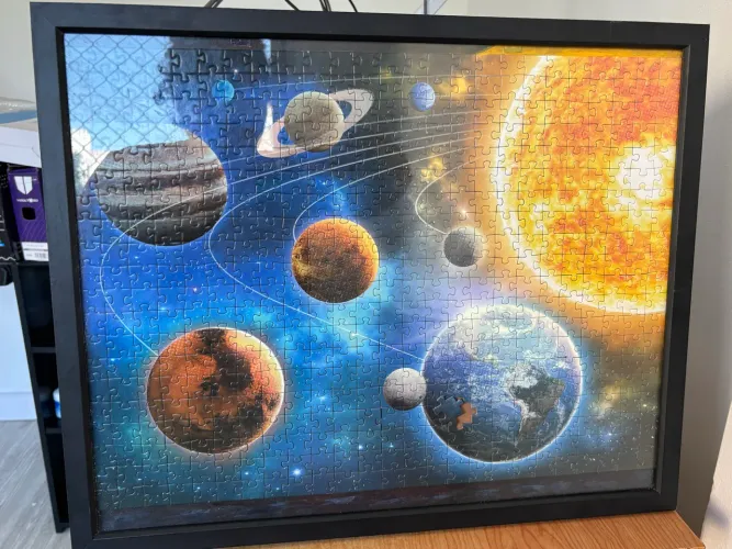 Quadro quebra cabeça montado 