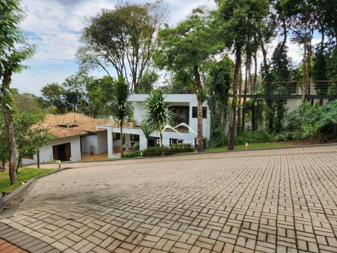 Casa com 4 dormitórios à venda, 370 m² por R$ 1.400.000,00 - Condomínio Retiro do Chalé - 