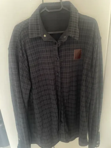 Camisa flanelada preta e cinza G da vila Jeanne co