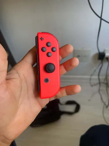 Joy-Com Nintendo lado direito e carregador original