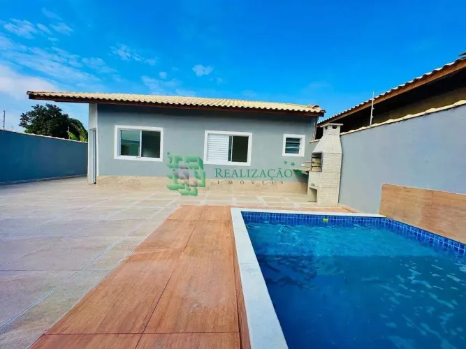 Linda casa com Piscina lado Praia Itanhaém