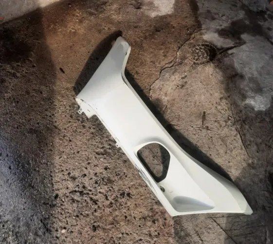 Carenagem esquerda traseira inferior PCX