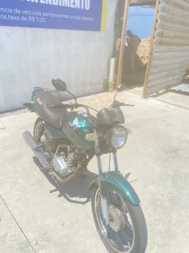 Moto cargo com a roupa da Titan