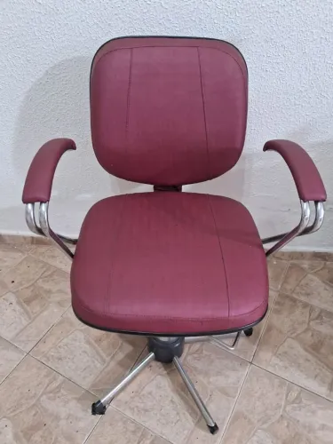 Cadeira de cabeleireiro.