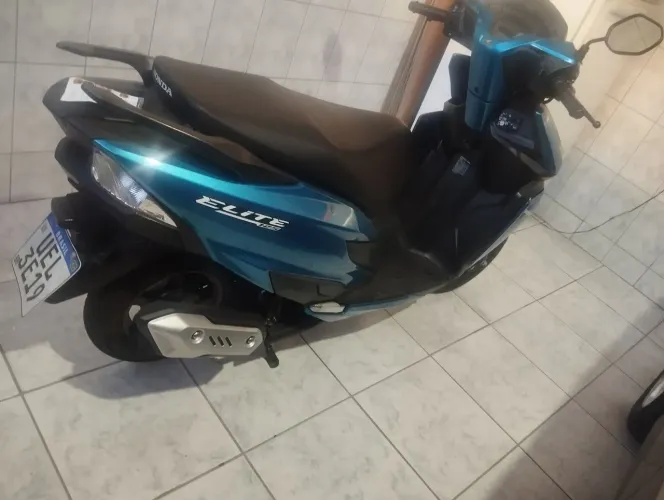 Estou vendendo elite 125 cc muito Nova 1.300 Km rotador