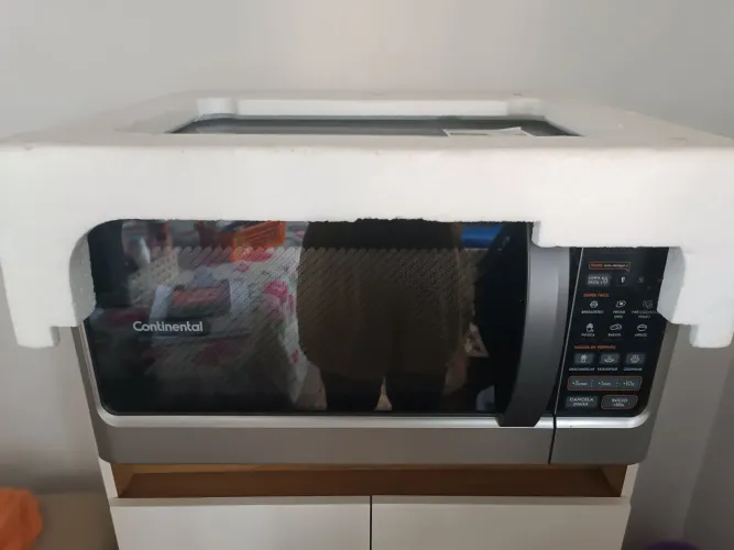 Vendo microondas 34 litros Prata novo
