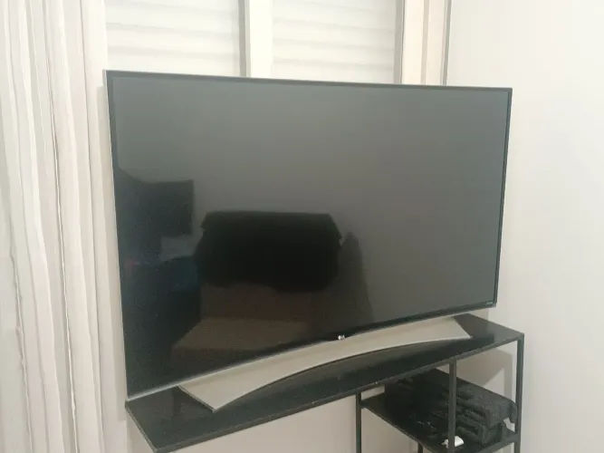 TV LG 4KUHD de 55" de Tela Curva