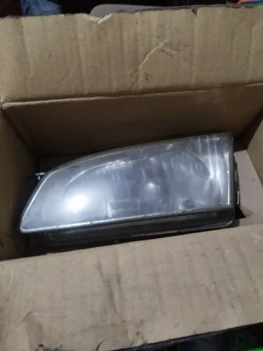 Farol do Toyota Corolla 2001