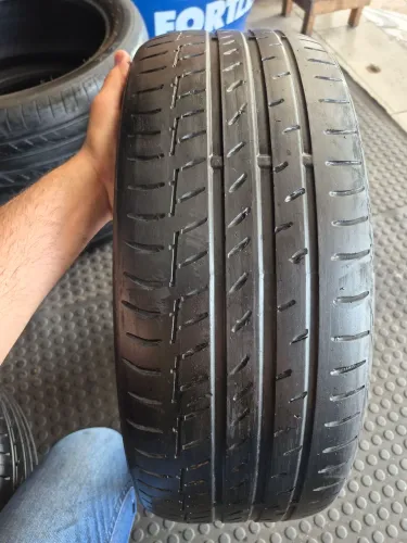 Um pneu 215/45/18 continental reaberto (130 em 2× no ct