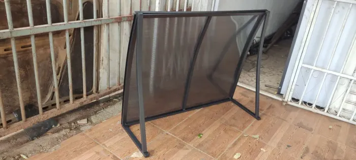 Toldo cobertura em policarbonato fumê