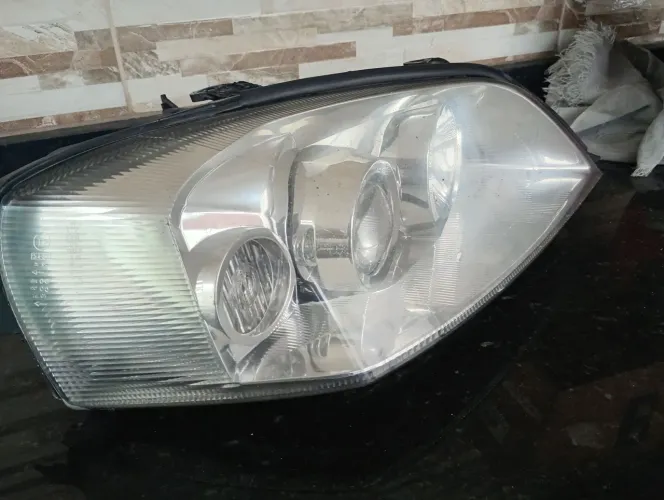 Farol direito Astra 2001 em diante cara de trem