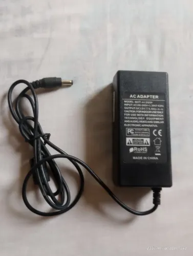 Vendo um Adaptador Ac Carregador/Energia BHT-A1260P 12v 100-240v-5.0A-63hz(veja descrição)