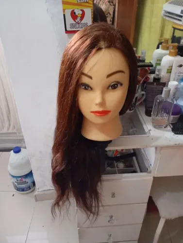 Cabeça de boneca para treino 