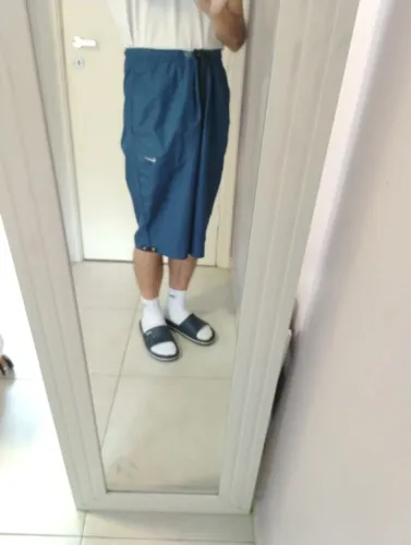 Bermuda Nike (comprimento cobre o joelho)