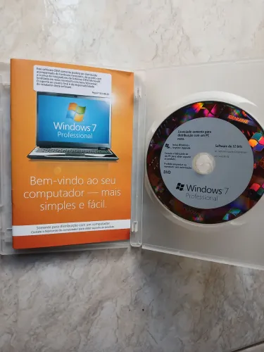 DVD original Windows 7 Professional 32 bits. 2 DVDs