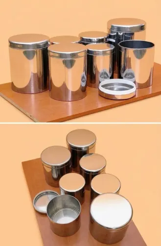Conjunto de 7 latas de aço inox usadas para mantimentos ou usos diversos.