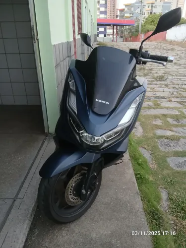 vendo pcx dlx em ótimo estado.