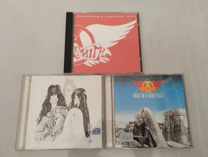 Lote Combo 3 CDs Aerosmith Greatest Hits Draw The LINE Rock In A Hard Place Guns N' Roses