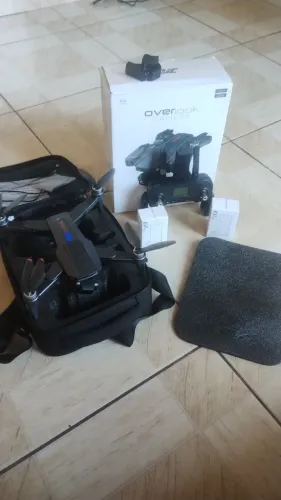 Drone excelente 3bateria guinbal de 3exo case 
