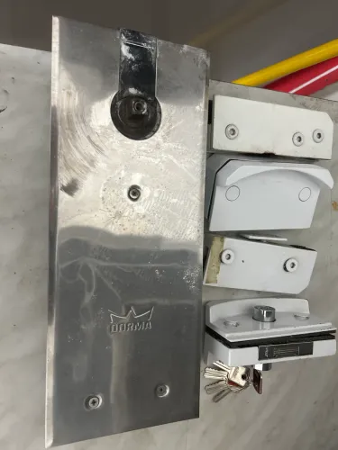 Mola DORMA para porta de vidro