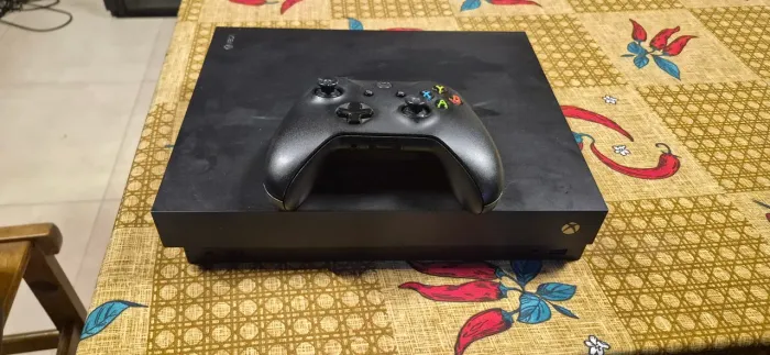 Xbox One X 1TB 4K +1Controle<br>?<br>O mais potente da geração, rodando jogos em 4K