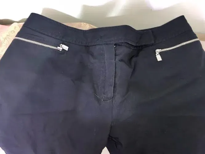 Tamanho 42, calça preta, marca Cori