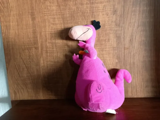 Pelúcia dino Flintstones usada na condição
