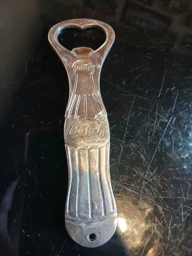 Abridor de garrafa coca cola