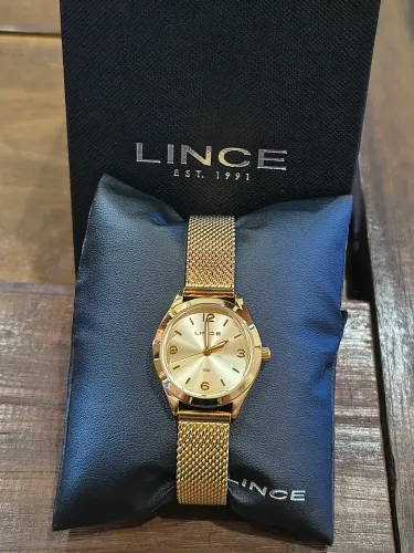 Relógio feminino dourado novo, original e 15 meses de garantia.
