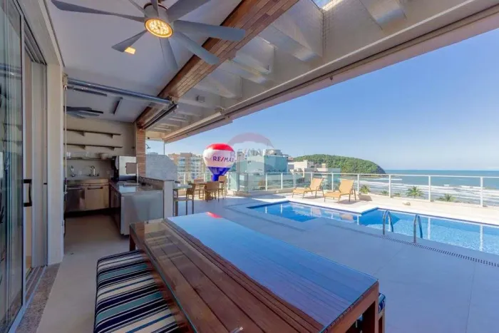 Exclusiva cobertura penthouse pé na areia - Condomínio Riviera de São Lourenço.